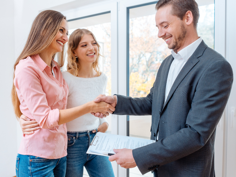 Real estate agent approving rental property after professional carpet cleaning and pest control.